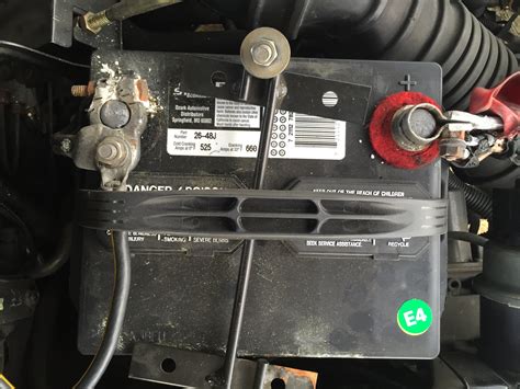 2001 ford escort battery terminal Loosen the negative battery clamp with an 8mm socket and ratchet